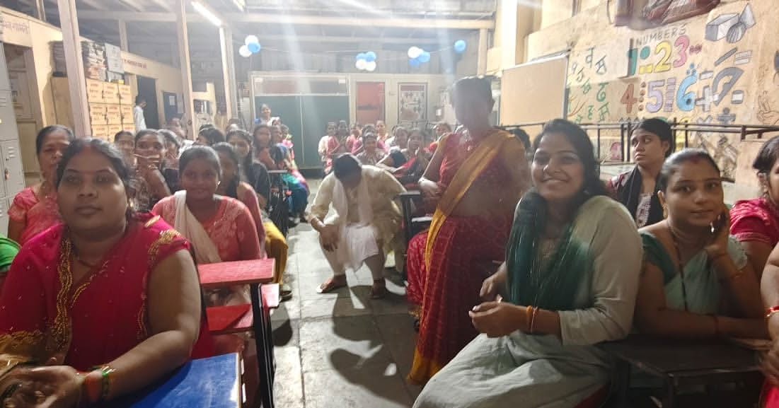 Volunteers Interacting with Students